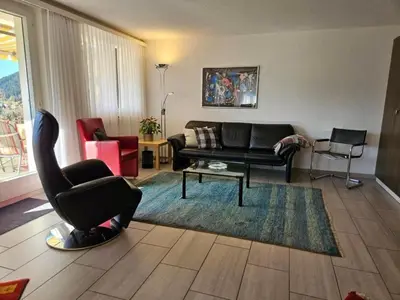 Ein Sitzbereich in der Unterkunft Apartment Chalet Friedheim by Interhome