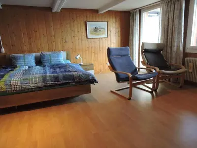 Ein Bett oder Betten in einem Zimmer der Unterkunft Apartment Berg- und Seeblick by Interhome