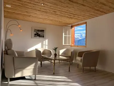 Ein Sitzbereich in der Unterkunft Holiday Home Chalet Felsli by Interhome