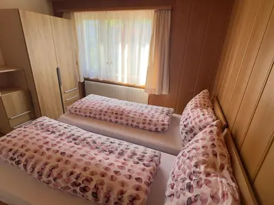 Ein Bett oder Betten in einem Zimmer der Unterkunft Apartment Chalet Acheregg by Interhome
