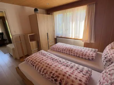 Ein Bett oder Betten in einem Zimmer der Unterkunft Apartment Chalet Acheregg by Interhome
