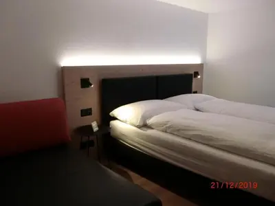 Ein Bett oder Betten in einem Zimmer der Unterkunft Apartment Chalet Raufthubel by Interhome