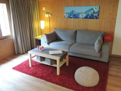 Ein Sitzbereich in der Unterkunft Holiday Home Lengwald Hiisli by Interhome