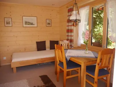 Ein Bett oder Betten in einem Zimmer der Unterkunft Apartment Chalet Birkli by Interhome
