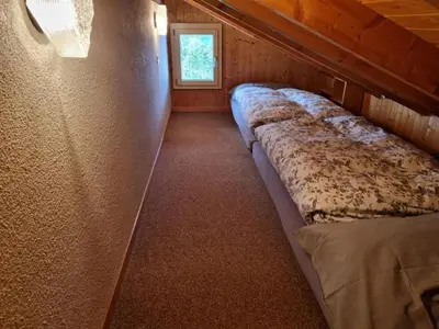 Ein Bett oder Betten in einem Zimmer der Unterkunft Apartment Hüttbödeli by Interhome