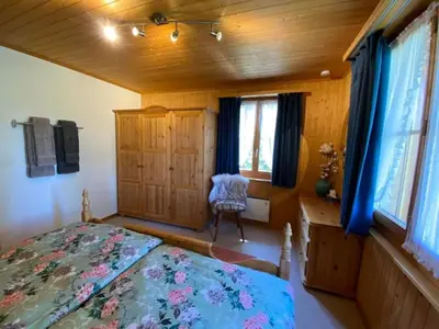 Ein Bett oder Betten in einem Zimmer der Unterkunft Holiday Home Chalet Specht by Interhome