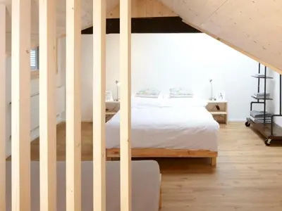 Ein Bett oder Betten in einem Zimmer der Unterkunft Apartment Rothorn by Interhome