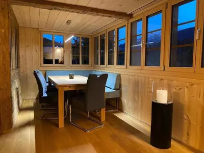 Ein Sitzbereich in der Unterkunft Holiday Home Chalet Brünig mit zwei Wohnungen by Interhome