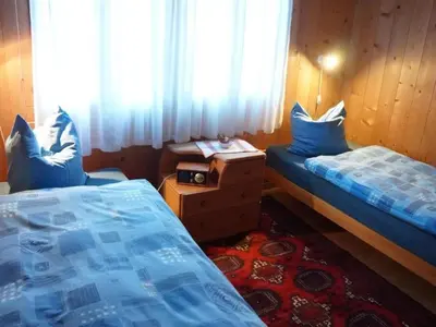 Ein Bett oder Betten in einem Zimmer der Unterkunft Apartment Darioli by Interhome