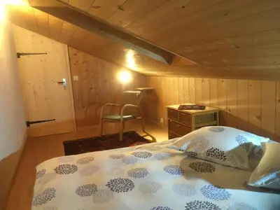 Ein Bett oder Betten in einem Zimmer der Unterkunft Apartment Darioli by Interhome