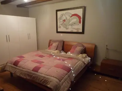 Ein Bett oder Betten in einem Zimmer der Unterkunft Apartment Chalet Mund by Interhome