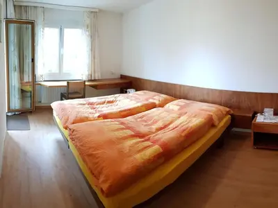 Ein Bett oder Betten in einem Zimmer der Unterkunft Apartment Ferienwohnung mit Bergblick by Interhome