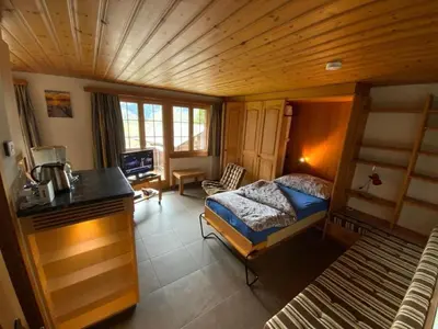 Ein Bett oder Betten in einem Zimmer der Unterkunft Apartment Chalet Barbara by Interhome