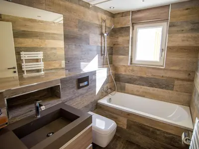 Ein Badezimmer in der Unterkunft Apartment HAus Cristal Whg 61 by Interhome