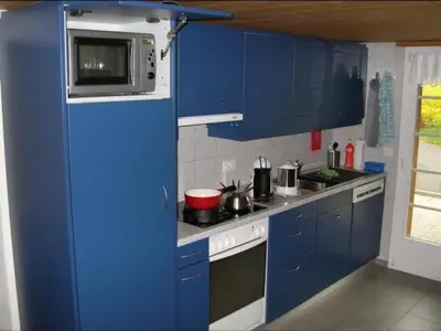 Küche/Küchenzeile in der Unterkunft Apartment Chalet Herrschaft 4 Bett Wohnung by Interhome