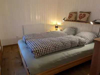 Ein Bett oder Betten in einem Zimmer der Unterkunft Holiday Home Chalet Le Griffon by Interhome
