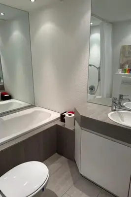 Ein Badezimmer in der Unterkunft Apartment LaConcorde Golf App2 by Interhome