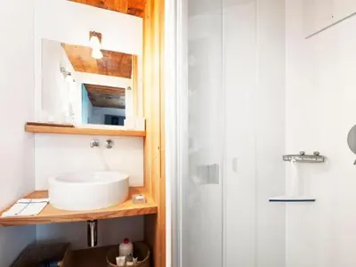 Ein Badezimmer in der Unterkunft Holiday Home Spycher Niederwald by Interhome