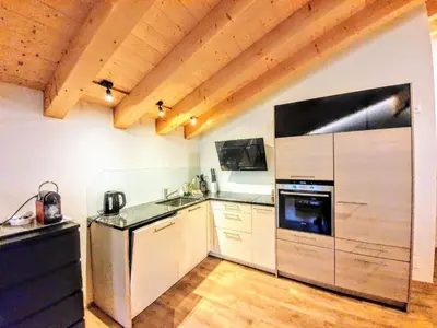 Küche/Küchenzeile in der Unterkunft Apartment Chalet Eigernordwand by Interhome