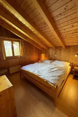 Ein Bett oder Betten in einem Zimmer der Unterkunft Apartment Chalet Siesta OG by Interhome