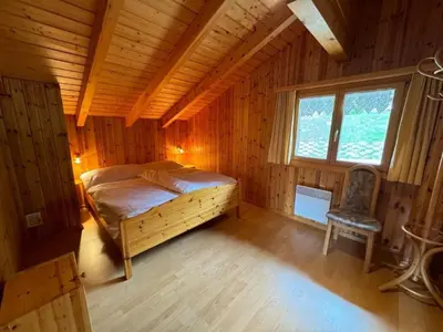 Ein Bett oder Betten in einem Zimmer der Unterkunft Apartment Chalet Siesta OG by Interhome