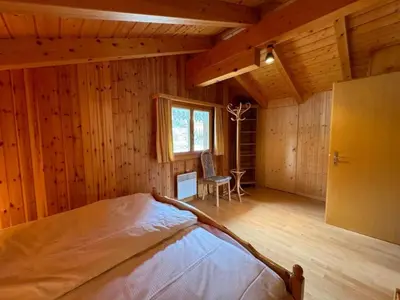Ein Bett oder Betten in einem Zimmer der Unterkunft Apartment Chalet Siesta OG by Interhome