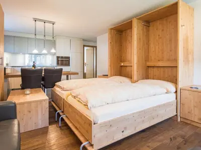Ein Bett oder Betten in einem Zimmer der Unterkunft Apartment Top Ferienwohnung Breithorn - SkiIn-SkiOut by Interhome