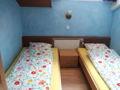 Ein Bett oder Betten in einem Zimmer der Unterkunft Holiday Home Chalet Imfeld-Gander by Interhome