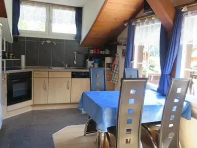 Küche/Küchenzeile in der Unterkunft Holiday Home Chalet Imfeld-Gander by Interhome