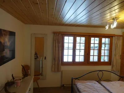 Ein Bett oder Betten in einem Zimmer der Unterkunft Apartment Haus Brog by Interhome