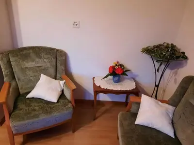 Ein Sitzbereich in der Unterkunft Apartment Chalet Bergfrieden by Interhome
