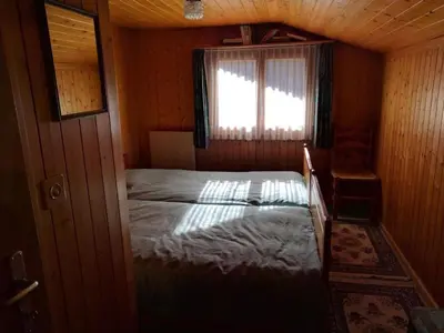 Ein Bett oder Betten in einem Zimmer der Unterkunft Holiday Home Chalet Marnelia by Interhome