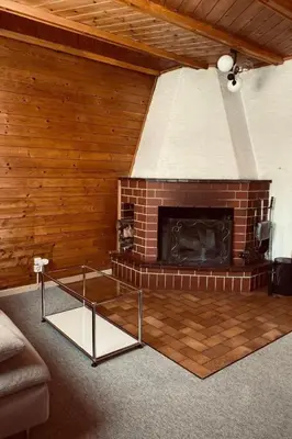 Ein Sitzbereich in der Unterkunft Apartment Chalet Bacchus - EG by Interhome