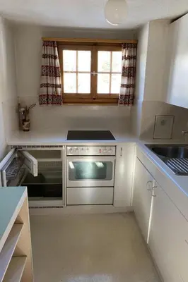 Küche/Küchenzeile in der Unterkunft Apartment Chalet Bacchus - OG by Interhome