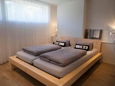 Ein Bett oder Betten in einem Zimmer der Unterkunft Apartment Lauigrund by Interhome