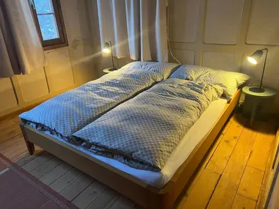 Ein Bett oder Betten in einem Zimmer der Unterkunft Apartment Haus Elsenmatte by Interhome