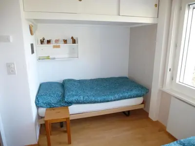 Ein Bett oder Betten in einem Zimmer der Unterkunft Apartment Paradiesli Steiger Lungern by Interhome