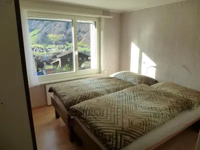 Ein Bett oder Betten in einem Zimmer der Unterkunft Apartment Paradiesli Steiger Lungern by Interhome