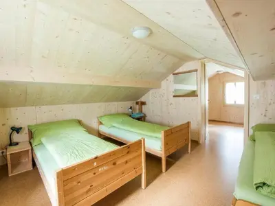 Ein Bett oder Betten in einem Zimmer der Unterkunft Holiday Home Wüthrich by Interhome