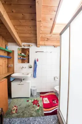 Ein Bett oder Betten in einem Zimmer der Unterkunft Holiday Home Wüthrich by Interhome