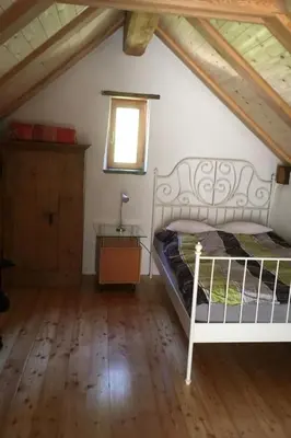 Ein Bett oder Betten in einem Zimmer der Unterkunft Holiday Home Rustikales Ca'd'Damunt by Interhome