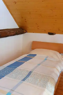 Ein Bett oder Betten in einem Zimmer der Unterkunft Apartment MAva -Haus mit Blick aufs Wasser by Interhome