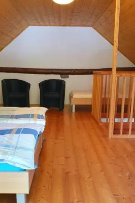 Ein Bett oder Betten in einem Zimmer der Unterkunft Apartment MAva -Haus mit Blick aufs Wasser by Interhome