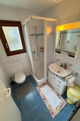 Ein Badezimmer in der Unterkunft Apartment Walserwohnung by Interhome