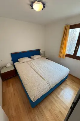 Ein Bett oder Betten in einem Zimmer der Unterkunft Apartment Walserwohnung by Interhome