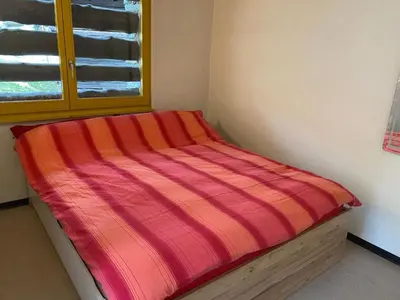 Ein Bett oder Betten in einem Zimmer der Unterkunft Holiday Home Rustico Monti di Rima by Interhome