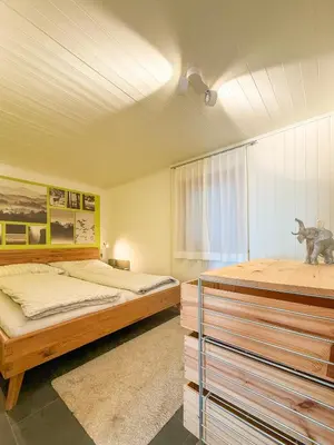 Ein Bett oder Betten in einem Zimmer der Unterkunft Chalet apartment with Mountain View