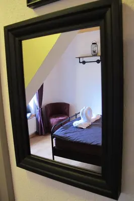 Ein Bett oder Betten in einem Zimmer der Unterkunft Café des Voyageurs Noës