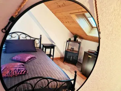 Ein Bett oder Betten in einem Zimmer der Unterkunft Café des Voyageurs Noës