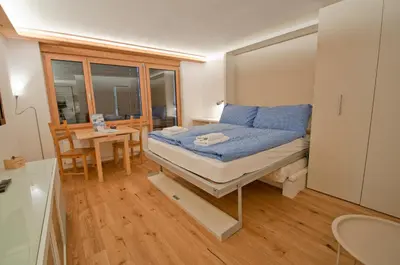 Ein Bett oder Betten in einem Zimmer der Unterkunft Studio Rollin